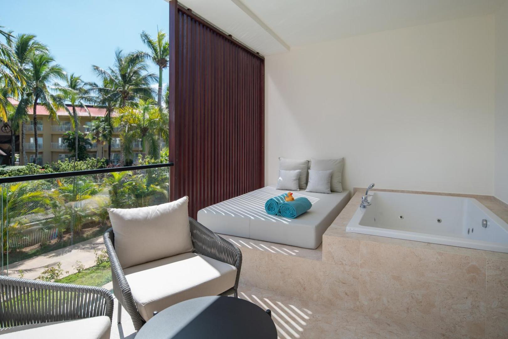 Suíte Júnior Deluxe com Vista Jardim e 2 Camas de Casal