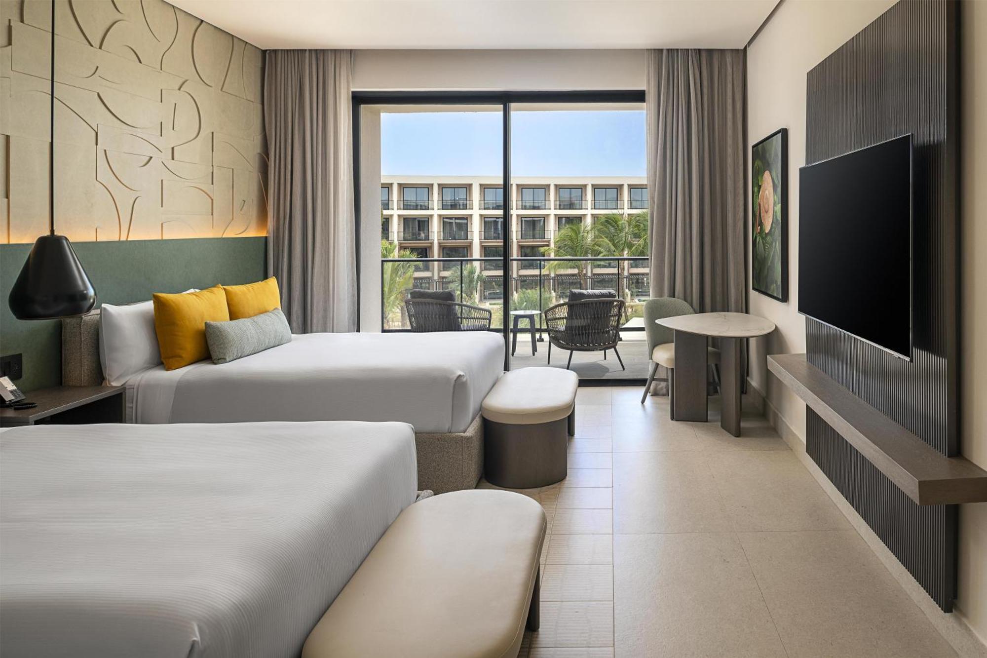 Queen Room with Two Queen Beds and Tropical View